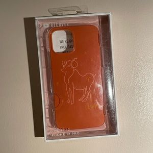 An Urban Outfitters orange Aires phone case for the IPhone 12 and 12 pro.